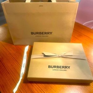 Burberry- Perfect packaging! Box, ribbons, and shopping bag.